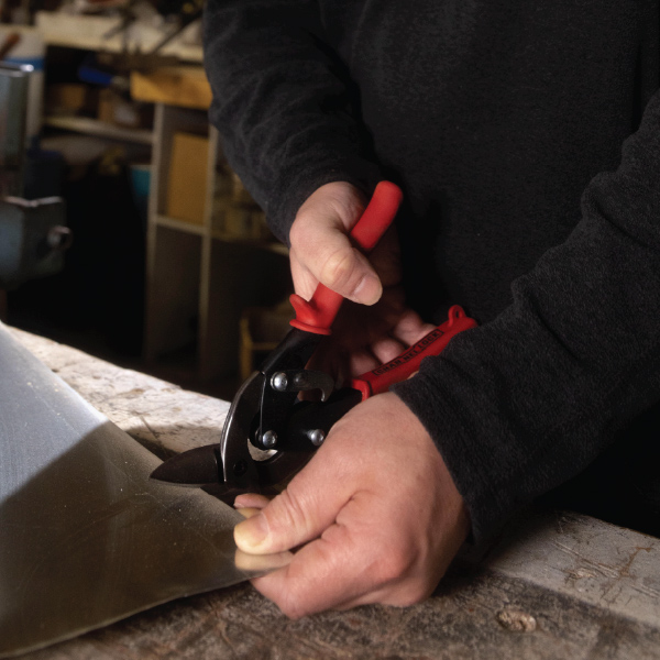 OFFSET BLADES DIRECT MATERIAL AWAY FROM THE OPERATOR