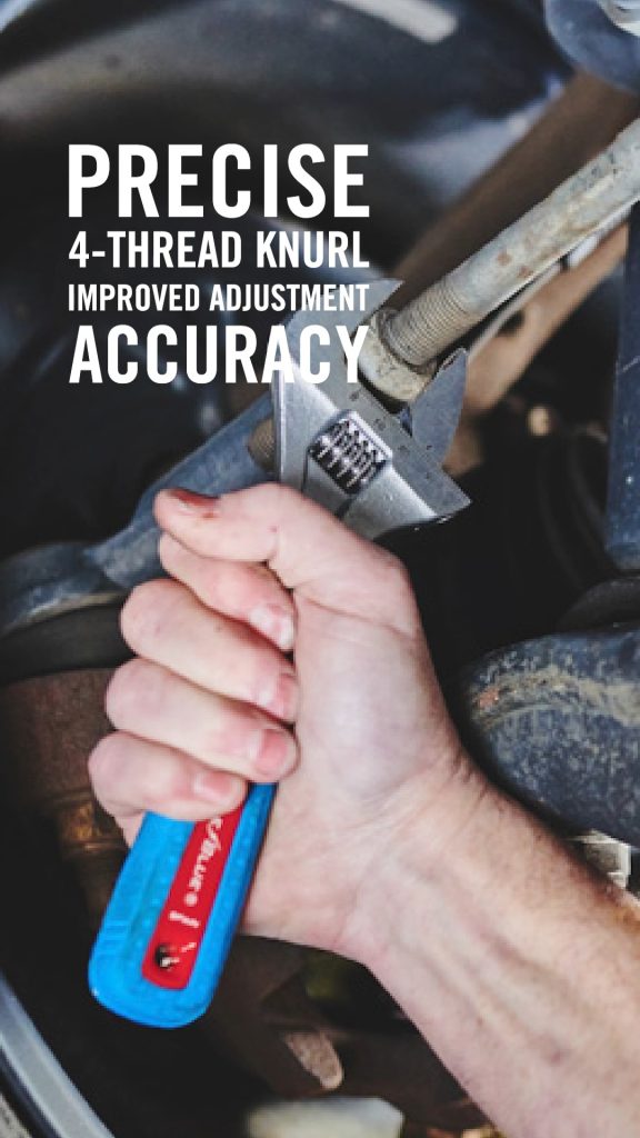A close-up of a hand gripping a CHANNELLOCK® blue-handled adjustable wrench on a metal bolt.